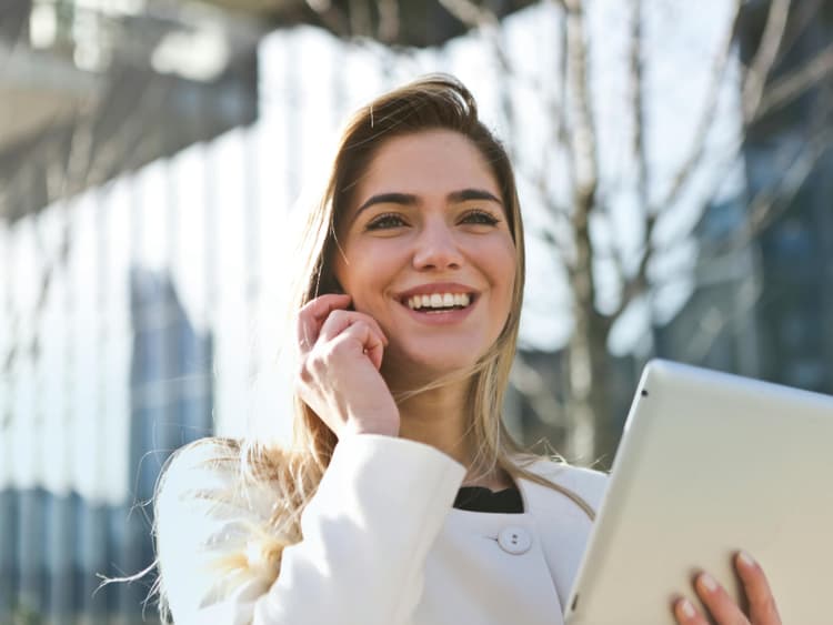 Business professional making phone call about late invoice payment