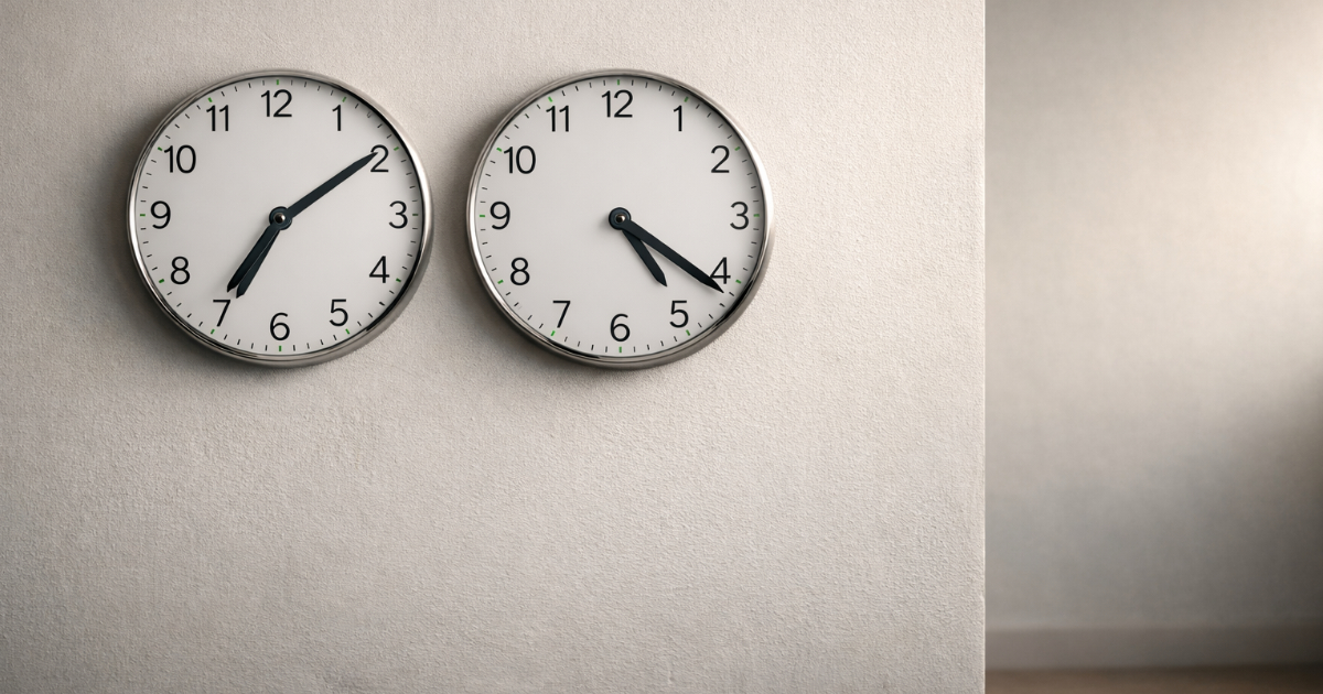 Two wall clocks side by side showing different times, suggesting work and payments across time zones