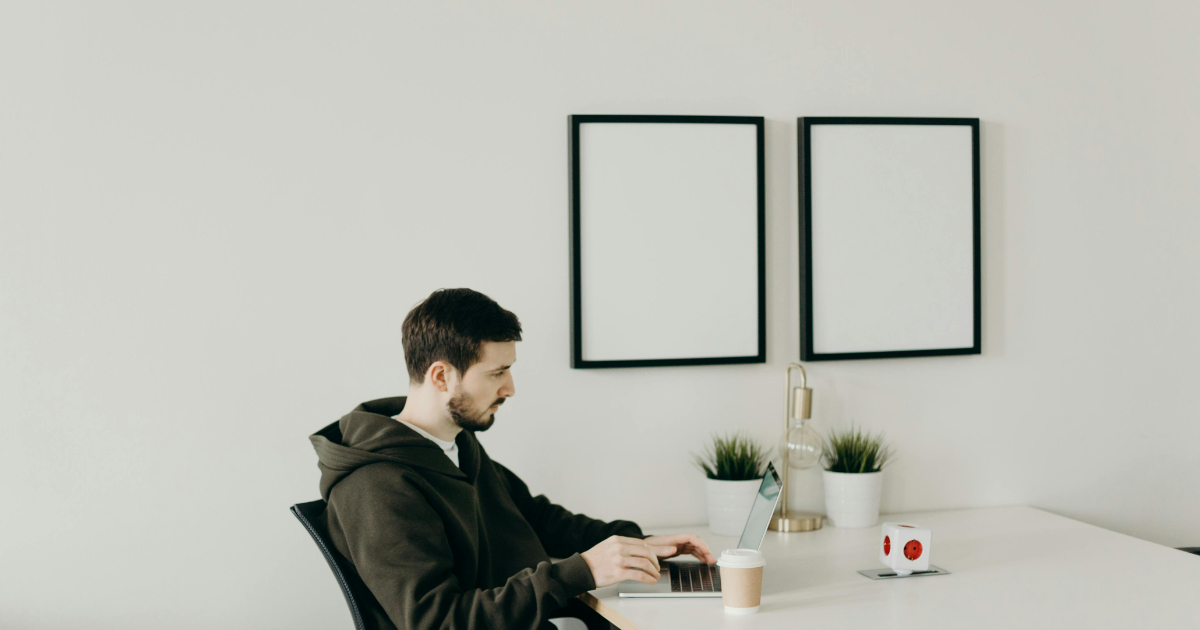 Confident freelancer working at a clean desk